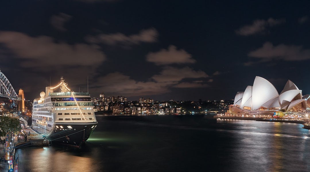 Azamara docked in Sydney, Australia at night.