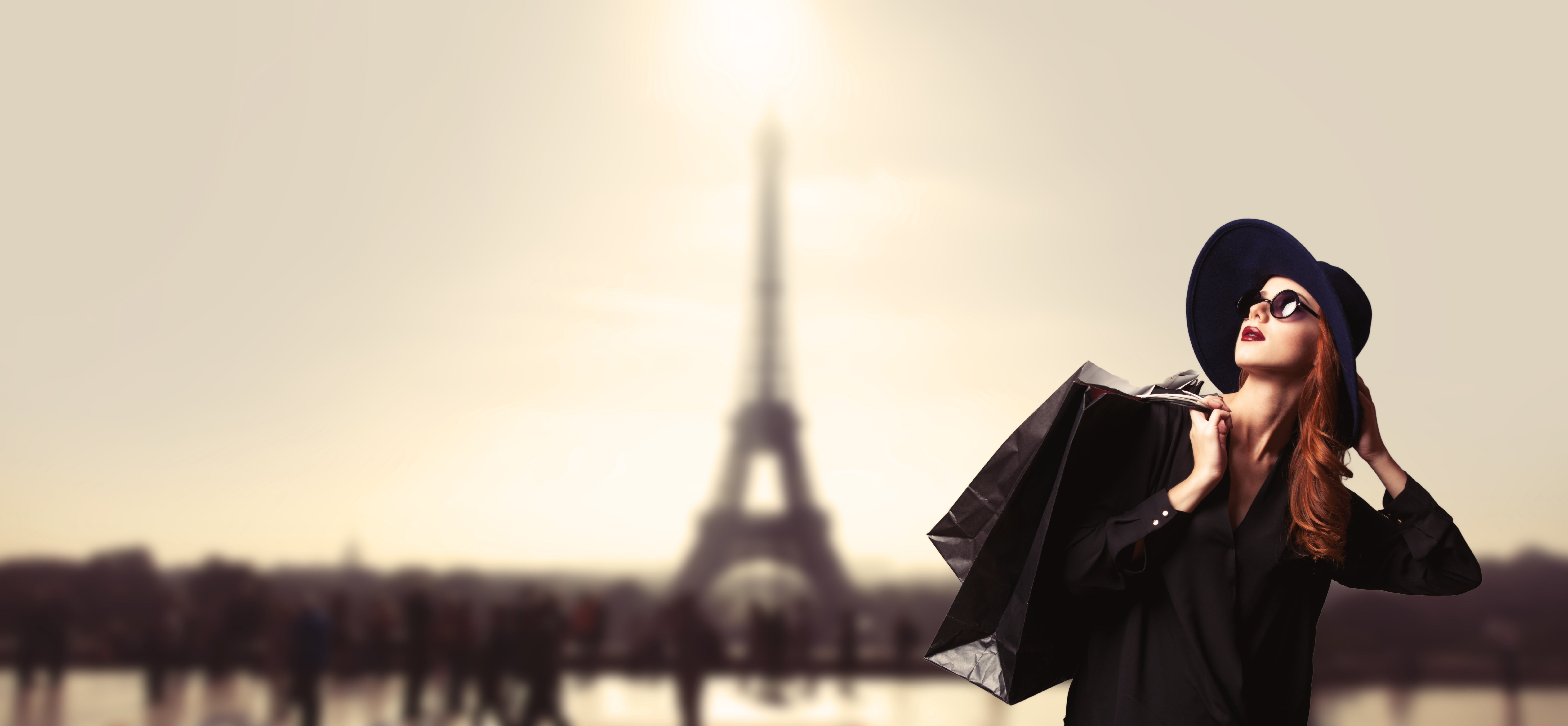 Woman in front of Eiffel Tower